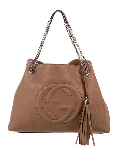 gucci bridle medium tote with tassles|Gucci medium tote bag.